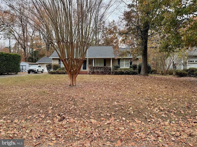 ranch-style home with a front yard