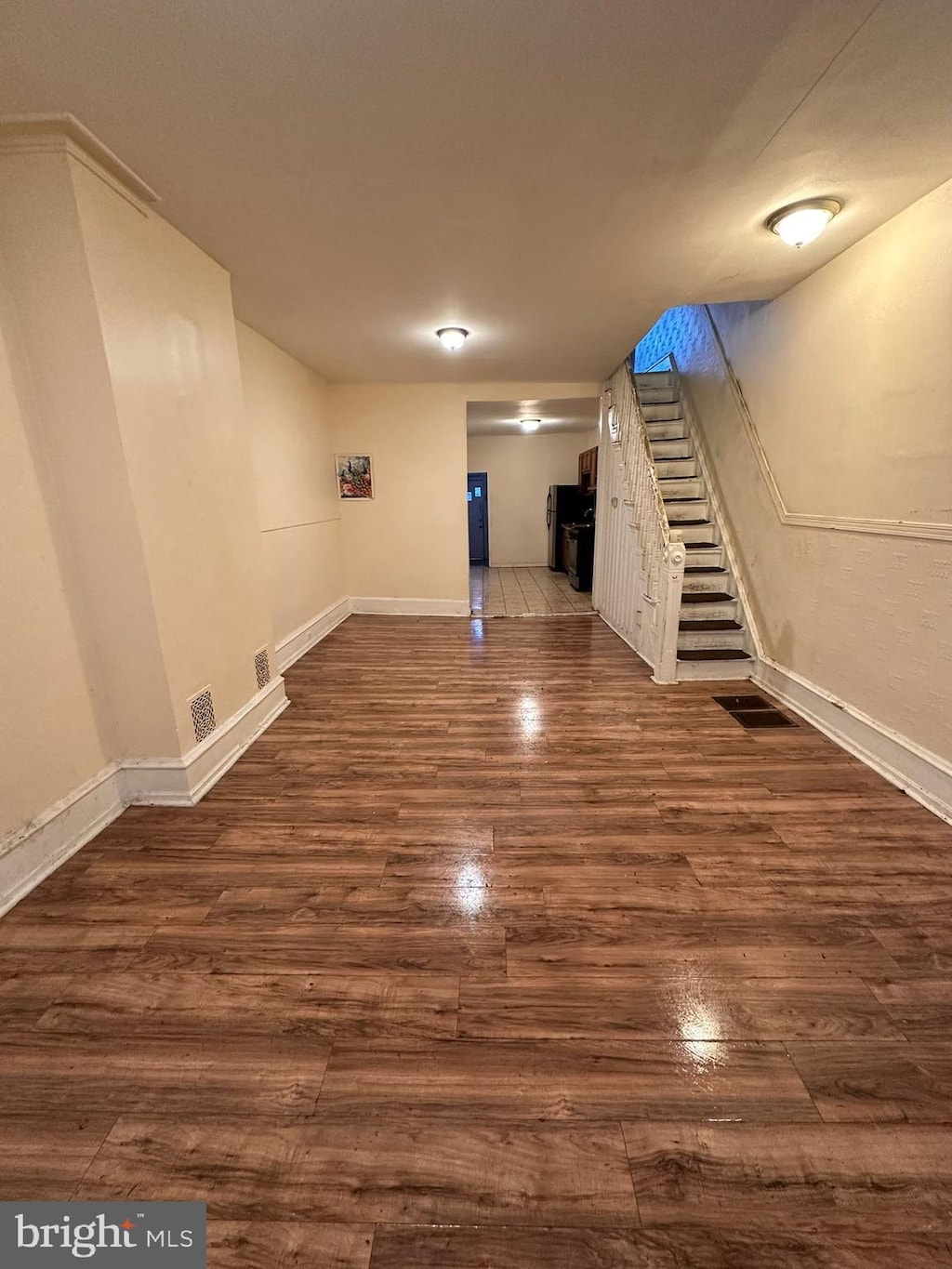 basement featuring dark wood-type flooring