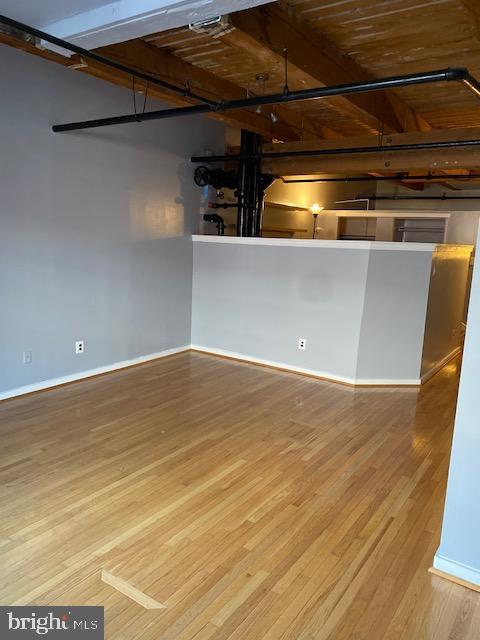 basement with wood-type flooring