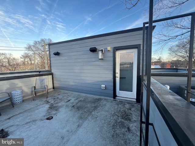 entrance to property with a patio