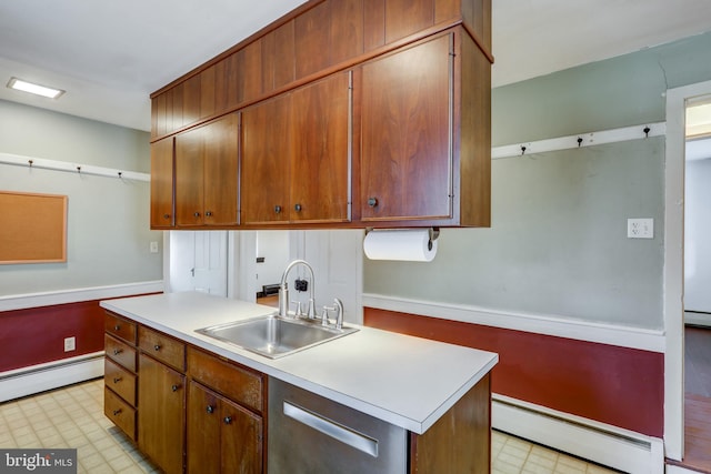 kitchen with stainless steel dishwasher, a kitchen island, sink, and baseboard heating