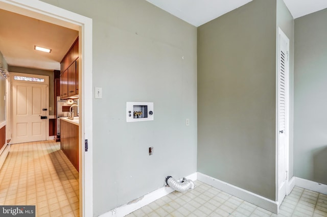 laundry area with hookup for an electric dryer and hookup for a washing machine