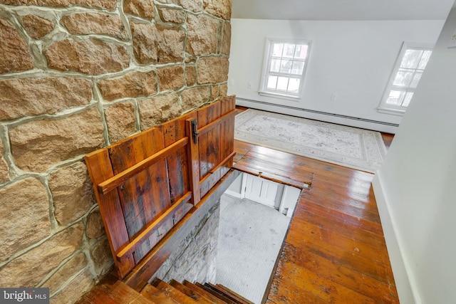 interior space featuring hardwood / wood-style floors and a baseboard radiator