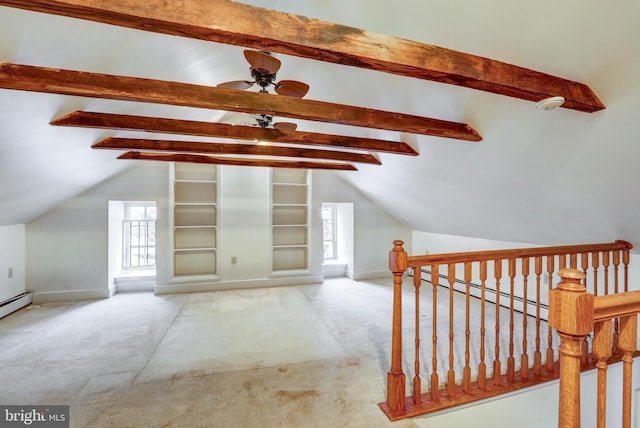 additional living space with ceiling fan, light colored carpet, lofted ceiling, and a baseboard heating unit