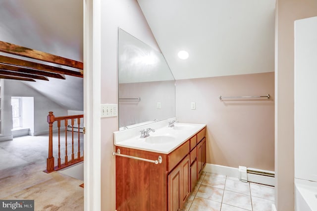 bathroom featuring baseboard heating, vaulted ceiling with beams, tile patterned flooring, and vanity