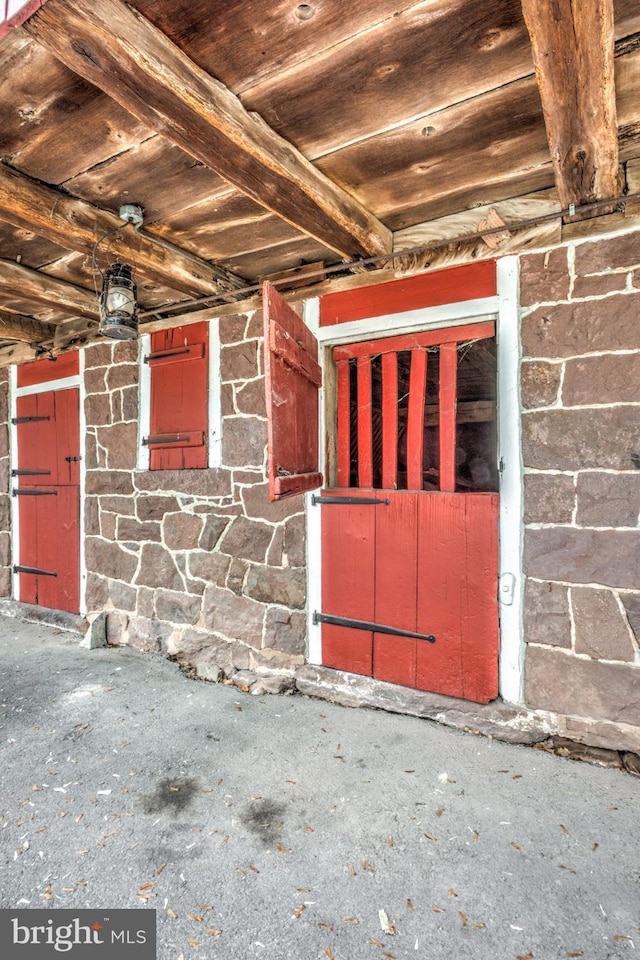 miscellaneous room with wood ceiling