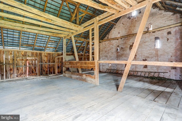 interior space featuring high vaulted ceiling