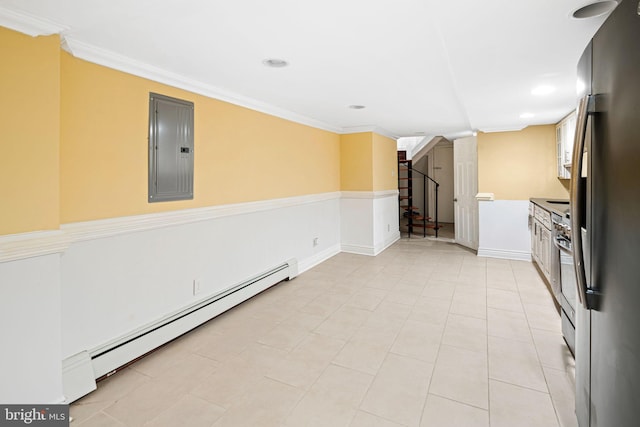 interior space featuring electric panel, stainless steel appliances, baseboard heating, and ornamental molding