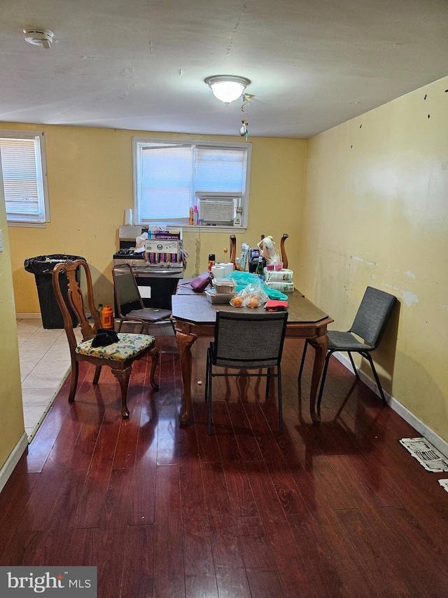 dining area with hardwood / wood-style flooring