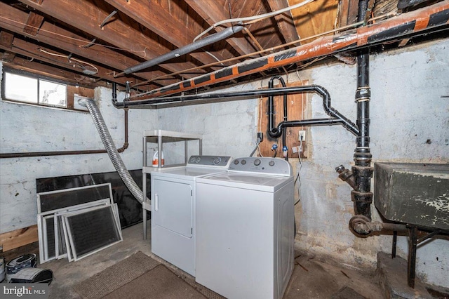 laundry room with washer and dryer