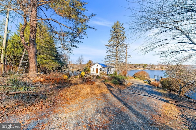 view of yard with a water view