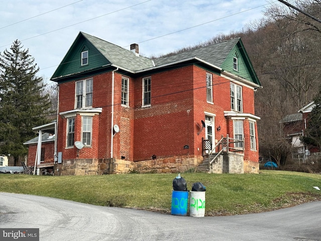 view of property exterior featuring a yard