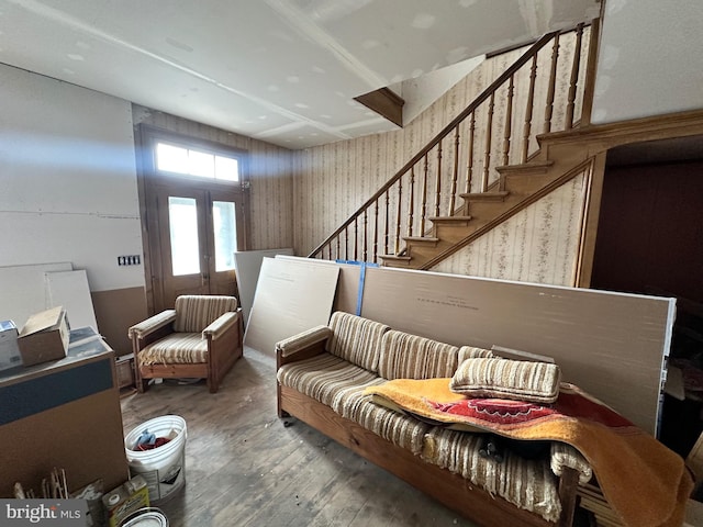 living room with french doors and hardwood / wood-style floors