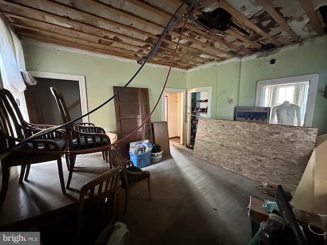 misc room with concrete flooring