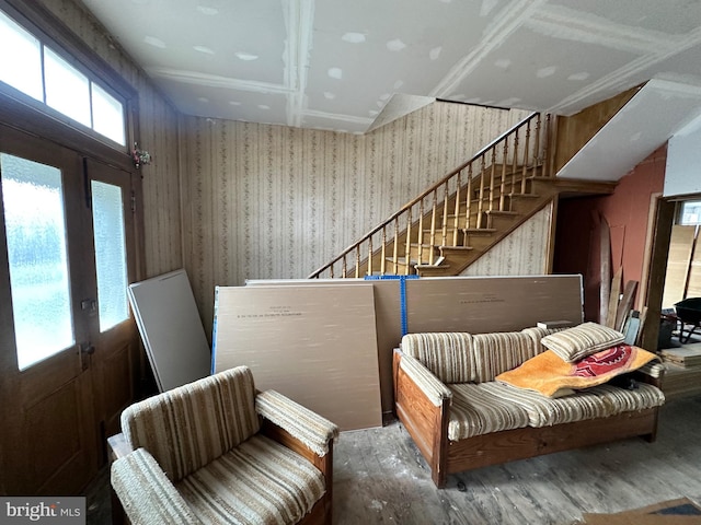 living area featuring french doors and hardwood / wood-style flooring