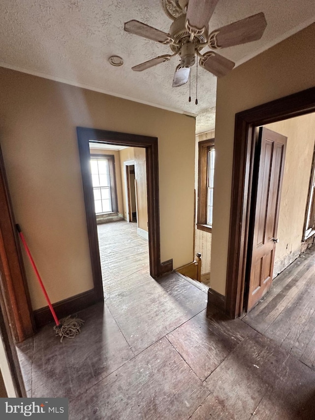 corridor with a textured ceiling