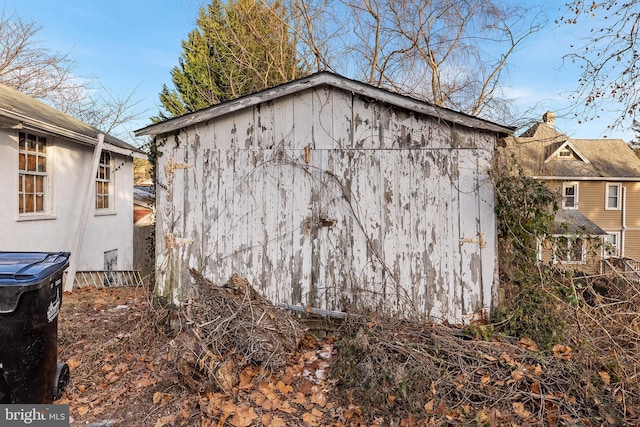 view of home's exterior featuring a shed