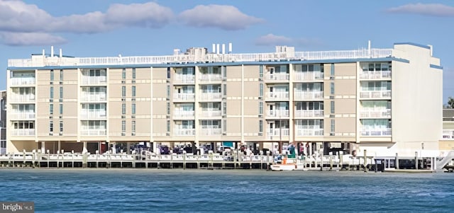 view of building exterior with a water view