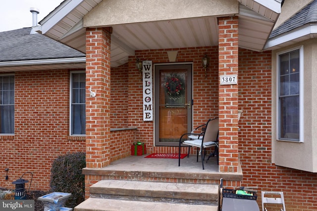 entrance to property with a porch