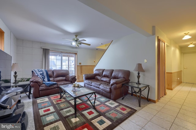 living room with light tile patterned floors and ceiling fan