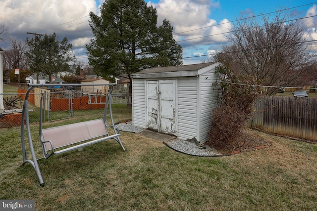 view of outdoor structure with a lawn