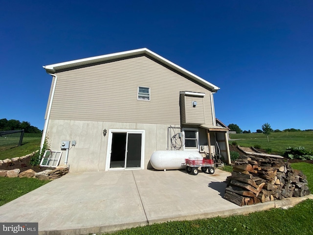 back of house with a patio area