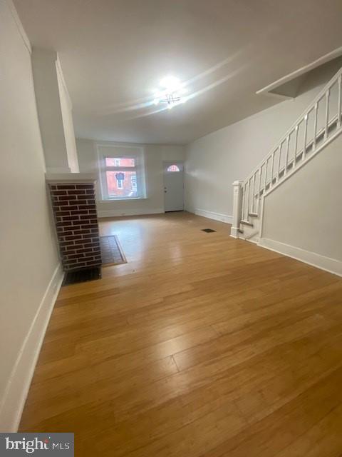 interior space with hardwood / wood-style flooring