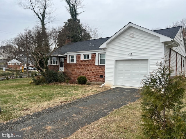 view of property exterior with a lawn and a garage