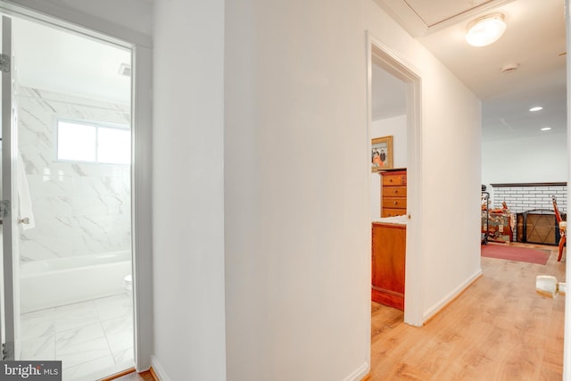 hall featuring light hardwood / wood-style floors