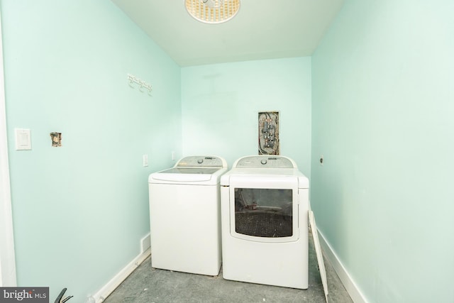 laundry area with separate washer and dryer