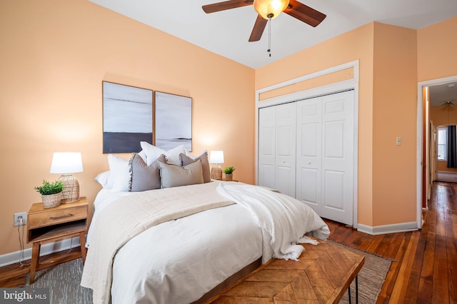 bedroom featuring a closet, ceiling fan, and dark wood-type flooring