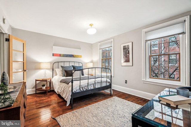 bedroom featuring dark wood-type flooring