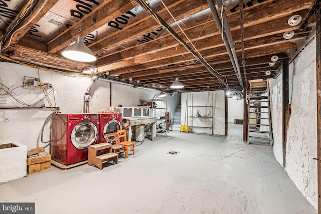 basement featuring washer and clothes dryer