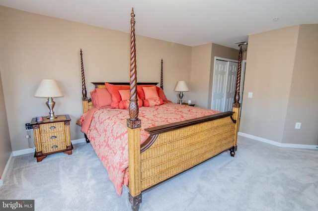 bedroom with carpet floors and a closet