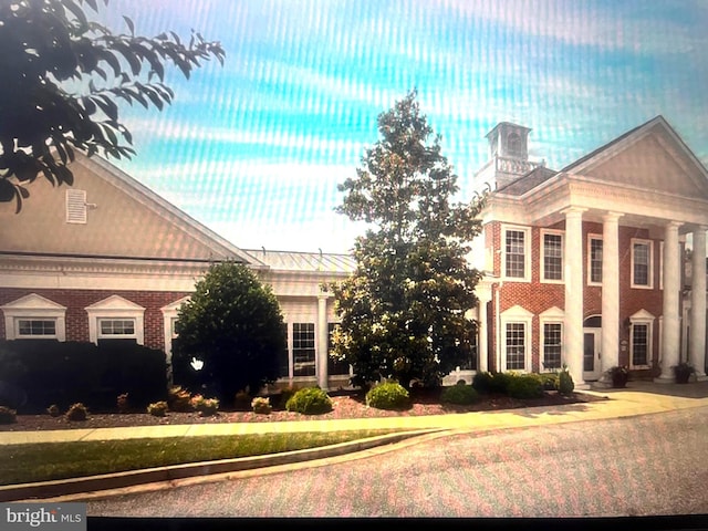 view of greek revival inspired property