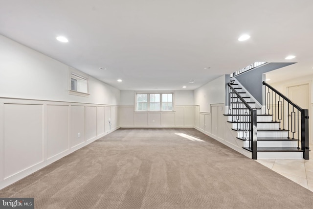 basement with light carpet