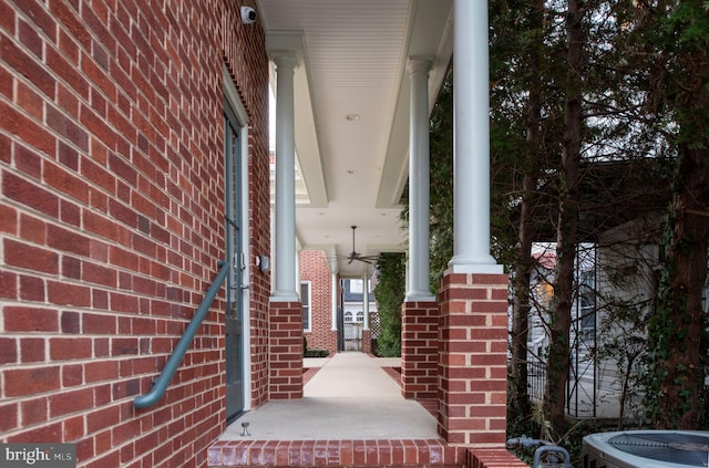 exterior space with a porch and ceiling fan