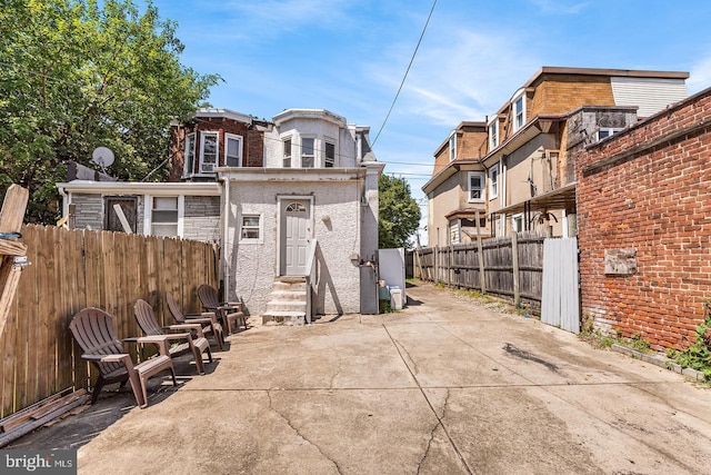 back of house featuring a patio