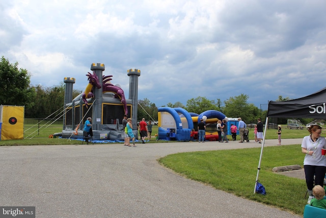 view of play area with a yard