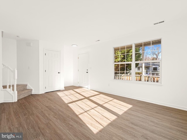 empty room featuring hardwood / wood-style floors