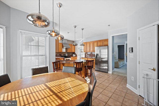 tiled dining space with plenty of natural light