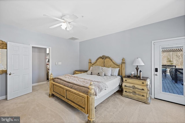 bedroom with ceiling fan, access to outside, and light colored carpet