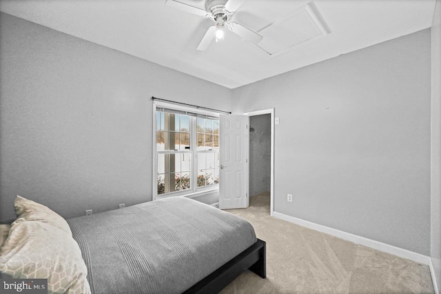 bedroom featuring ceiling fan and light colored carpet