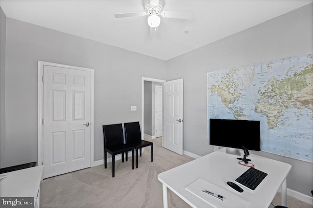 office area with light colored carpet and ceiling fan