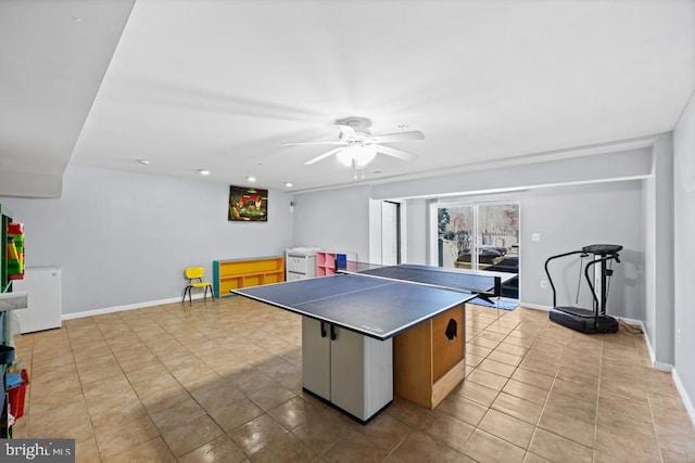 playroom featuring ceiling fan and light tile patterned floors