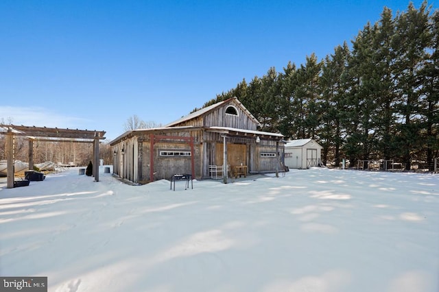 view of snow covered garage