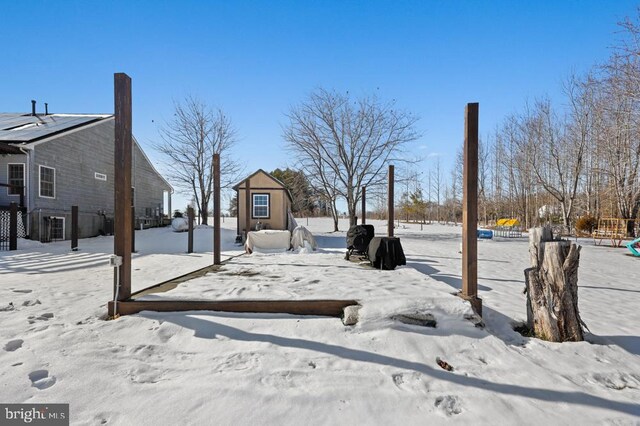 view of yard covered in snow