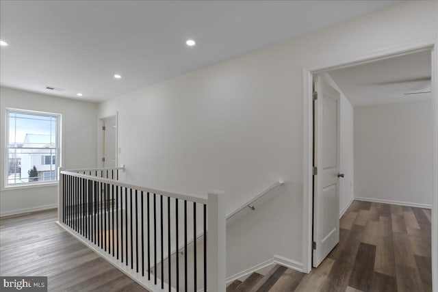 corridor featuring hardwood / wood-style floors