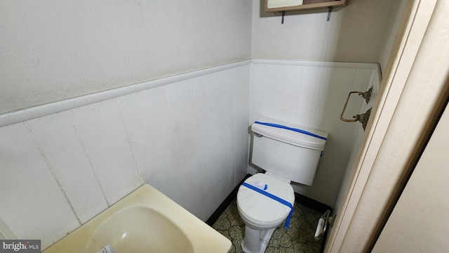 bathroom featuring toilet