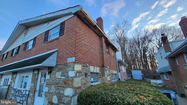 view of property exterior with central AC unit